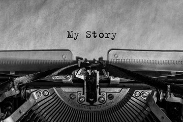 word my story printed on a vintage typewriter. journalism, writing.
