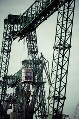 Fototapeta na wymiar Industrial cranes in Gdansk shipyards