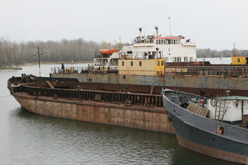Archive 2008 River port of Ust-Danube was destroyed in of crisis. Old rusty boats on stocks in dry...