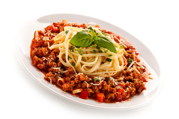 Pasta with bolognese sauce on white background