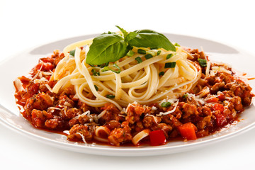 Pasta with bolognese sauce on white background
