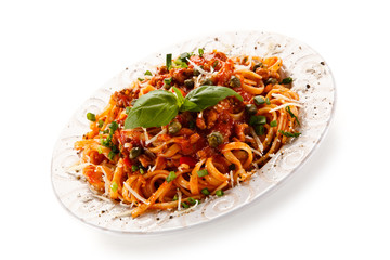 Pasta with bolognese sauce on white background