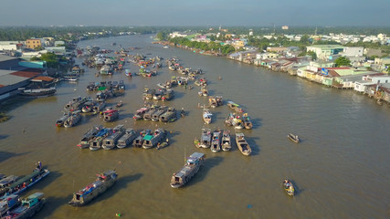 AERIAL: Flying over the famous Vietnamese floating market in idyllic Can Tho.