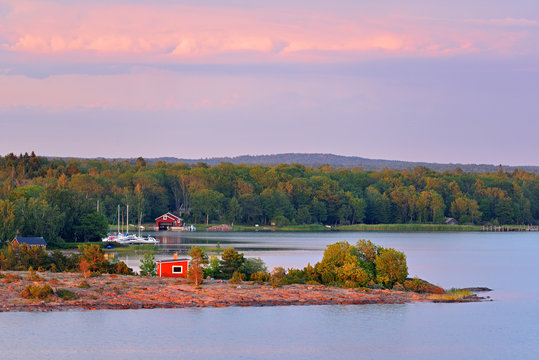 Pink sunset on Aland Islands. Finland