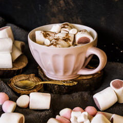 Good New Year spirit. Coffee with marshmallows and cinnamon. Pink mug. Cooking yourself. Photos for coffee. Home comfort. New Year. Christmas time. Winter mood.