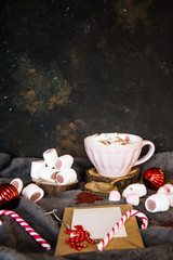 Good New Year spirit. Coffee with marshmallows and cinnamon. Pink mug. Cooking yourself.Home comfort. New Year. Christmas time. Winter mood.Letter to Santa Claus. To Do list.New Year resolution