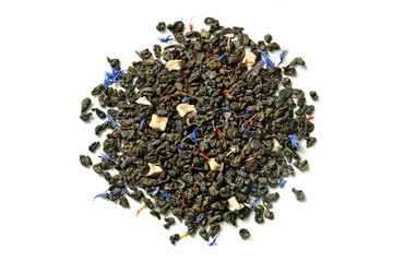 Green tea with soursop, safflower petals and knapweed on white background. Close up. High resolution.