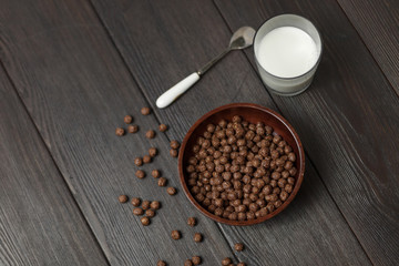 Whole grain Breakfast. Chocolate balls with milk