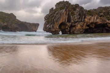 Fototapeta na wymiar Cuevas del Mar beach, Asturias, Spain