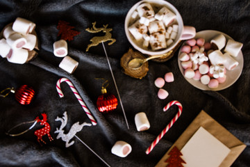 Good New Year spirit. Coffee with marshmallows and cinnamon. Pink mug. Cooking yourself.Home comfort. New Year. Christmas time. Winter mood.Letter to Santa Claus. To Do list.New Year resolution