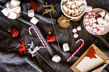 Good New Year spirit. Coffee with marshmallows and cinnamon. Pink mug. Cooking yourself.Home comfort. New Year. Christmas time. Winter mood.Letter to Santa Claus. To Do list.New Year resolution