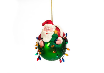 Santa Claus toy on a rope for a New Year tree and pine decoration for a New Year and Christmas tree