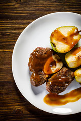 Grilled beefsteak with pears