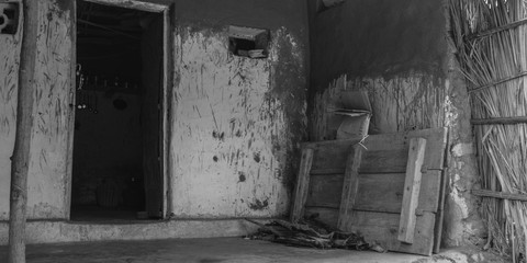 Black and white shot of Abandoned house in village of India