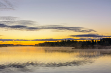 Obraz na płótnie Canvas Early morning on the lake in the Leningrad region.