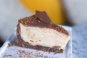 Caramel cheesecake with caramel sauce and nuts