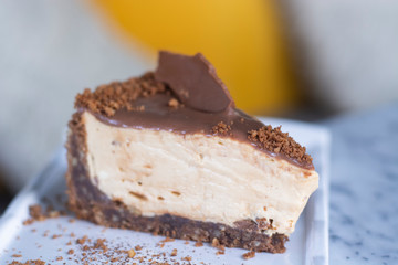 Caramel cheesecake with caramel sauce and nuts