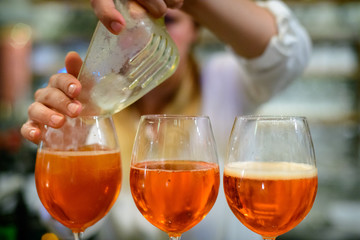 Red cocktail preparation bartender at work