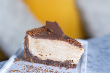 Caramel cheesecake with caramel sauce and nuts