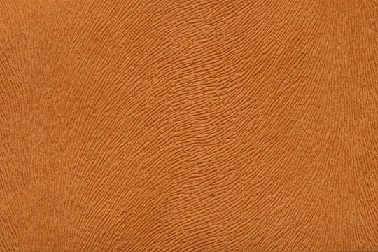 bright brown background with embossed