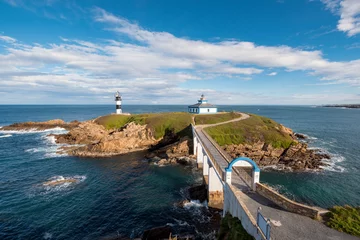 Photo sur Plexiglas Phare Pancha island lighthouse in Ribadeo coastline, Galicia, Spain.