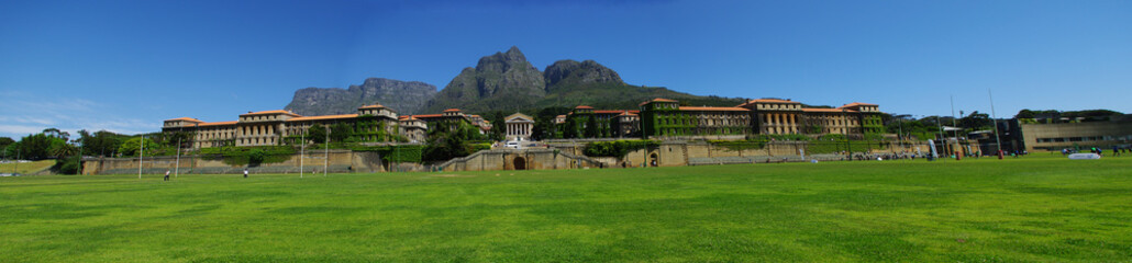 Fototapeta na wymiar The University of Cape Town and Devil's Peak / Table Mountain. Cecil Rhodes statue still in place. Cape Town, South Africa