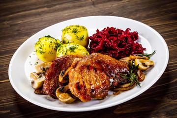Grilled pork chop with vegetables