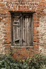 old wooden door on brick wall