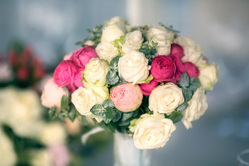 Wedding bouquet of roses on the dinner table close-up, DAVID AUSTIN.