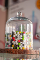 Colorful sweets in glass jar