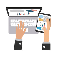 Businessman using laptop and smartphone