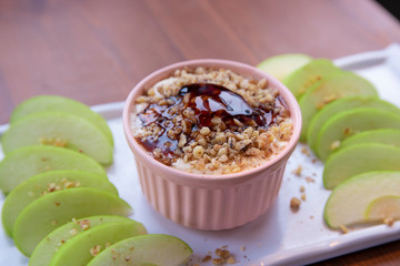 Caramel Apple Dip with nuts, caramel dressing and fresh apple slices