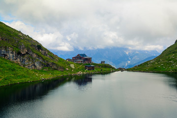 Beautiful landscape with Wildsee Lake ( Wildseelodersee ) and  the Wildseeloderhaus, mountain refuge hut, above Fieberbrunn in the Kitzbuhel Alps, Tirol, Austria