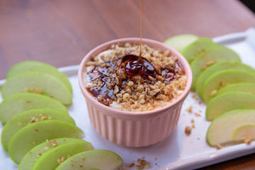 Caramel Apple Dip with nuts, caramel dressing and fresh apple slices