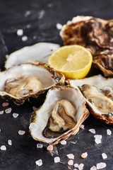 Oyster served with lemon and salt