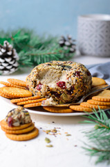 Vegan Cheeseball Appetizer Served with Crackers, Hummus, Nut Butter Spread