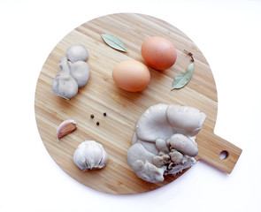  board with eggs, mushrooms and spices