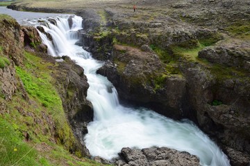 Fototapeta na wymiar Kolufossar, a waterfall in Iceland at the Kolugljufur canyon. Long exposure.