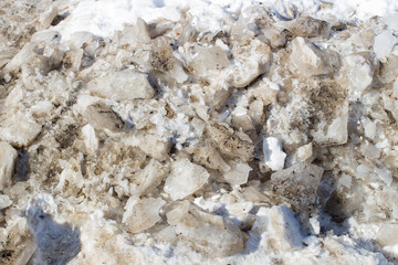 Snow covered pavement background in winter time