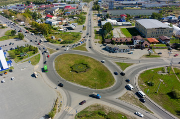 Tyumen, Russia - September 2, 2017: Aerial view onto Scherbakova and Veteranov Truda streets intersection