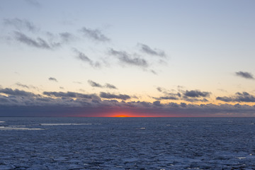 Sunset at the bay in winter