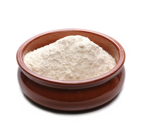 wheat flour in bowl isolated on white background