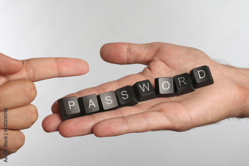 Fototapete open palm with eight computer buttons with letters password and pointing finger