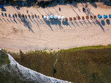 Indonesia, Bali, Aerial view of Balangan beach, sunloungers and beach umbrellas