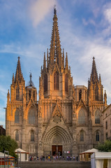 Fototapeta na wymiar View of the gothic Cathedral of the Holy Cross and Saint Eulalia, or Barcelona Cathedral, seat of the Archbishop of Barcelona, Spain at sunset