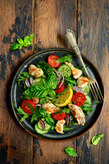 Vegetable salad with fried chicken.Top view with copy space.