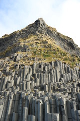 Columnar joints in the black sand beach
