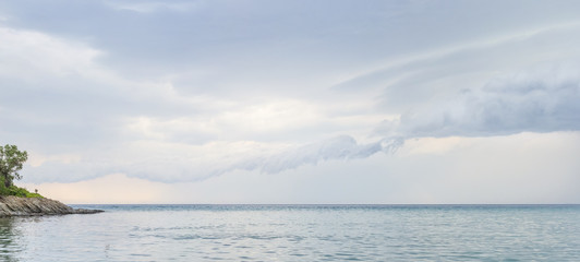 Sea water on cloudy day, nature background . Ocean view on cloudy summer day