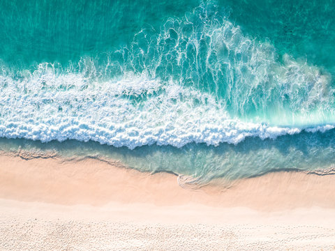 Waves at beach seen from above
