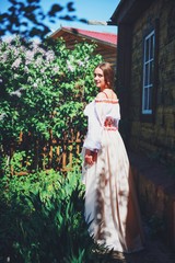 Fototapeta premium Beautiful young Russian girl in national costume